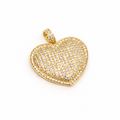 Gold heart-shaped pendant with embedded stones on a white background