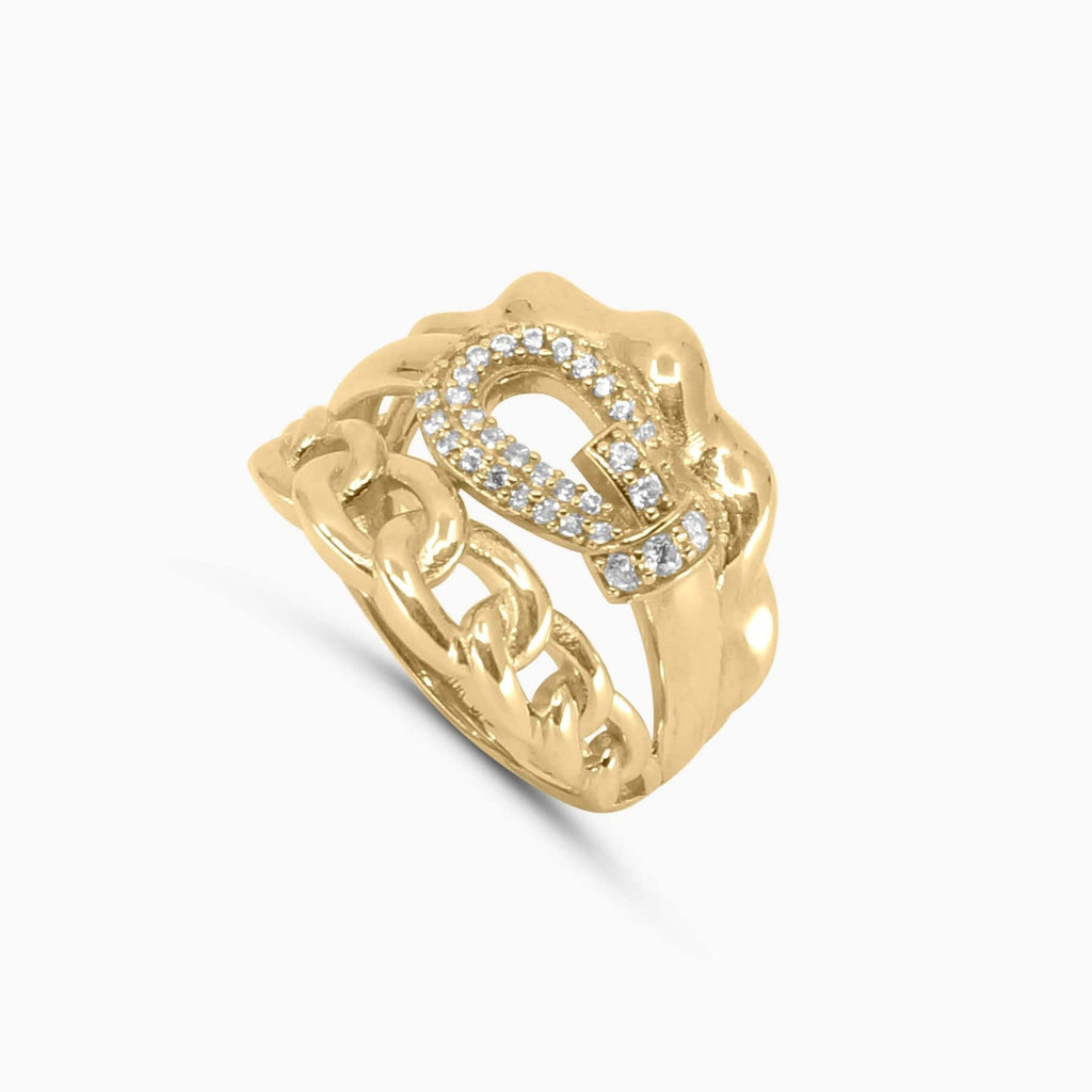 Gold ring with diamond accents on a white background