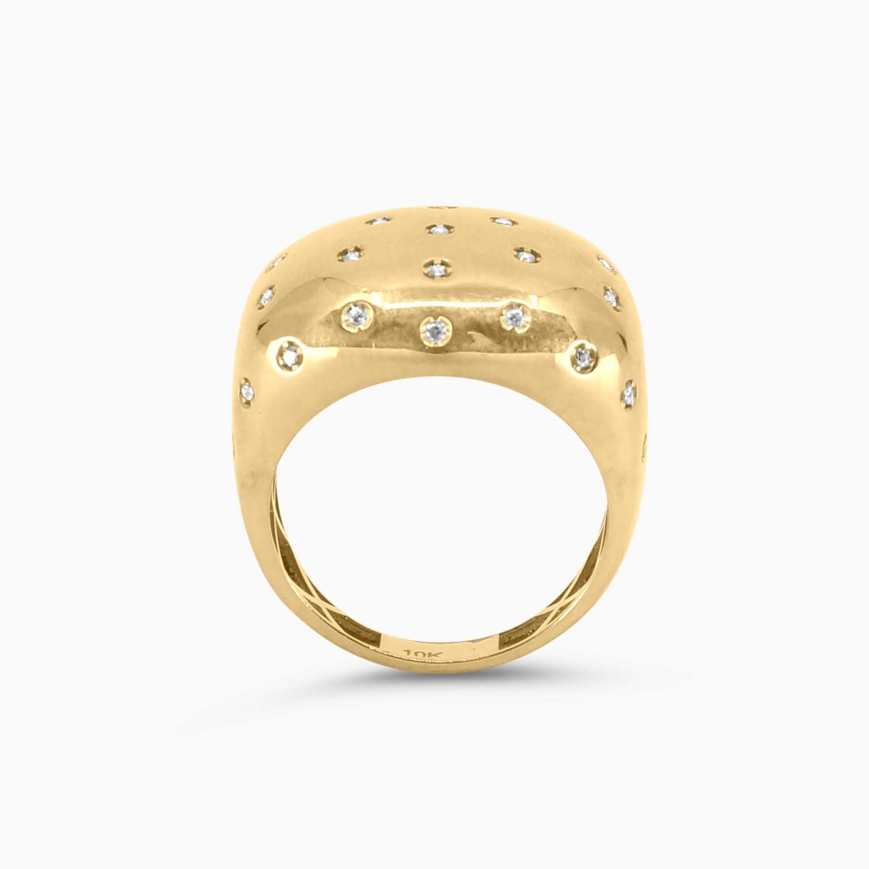 Gold ring with embedded stones on a white background