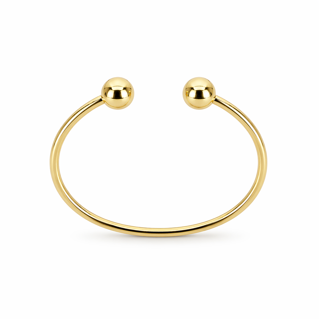 Gold bracelet with two spherical ends on a white background