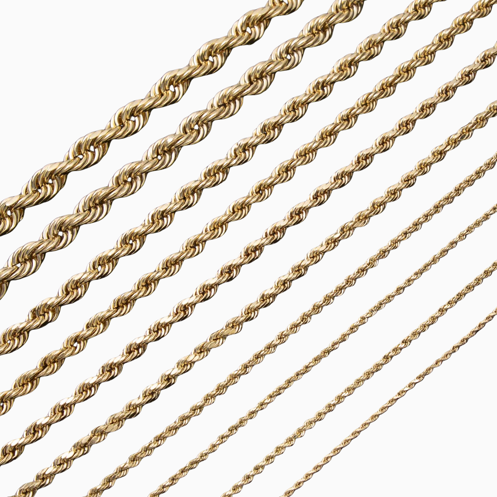 Gold rope chain on a white background