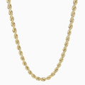 Gold rope chain necklace on a white background